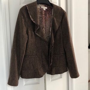 Brown tweed jacket.
